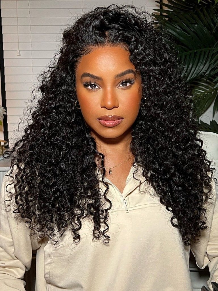 Woman with trendy curly hairstyle from Curly Hair Trends 2025