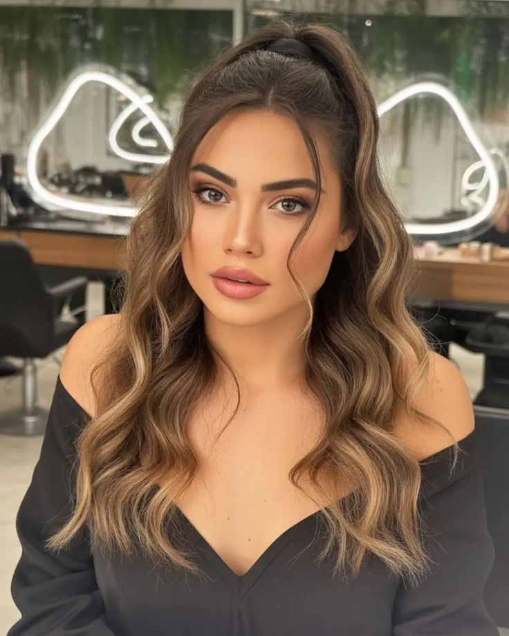 The Beauty of Sandy Brown Hair styled in soft waves under sunlight