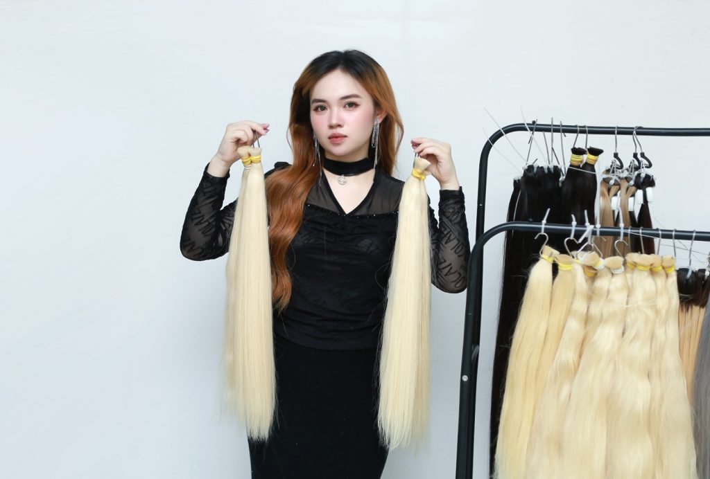 Woman with smooth hairstyle using Human Hair Extensions U Tip