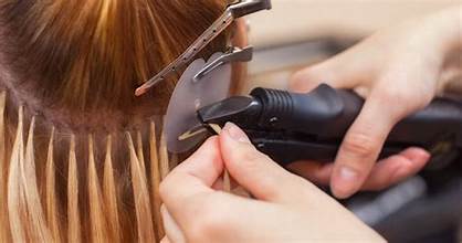 Woman showing before and after Hair Extension Transformations